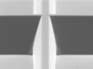 SEM-image-detail of Stencil-mask with array of recangular-frames and 15° sidewall-tapering.